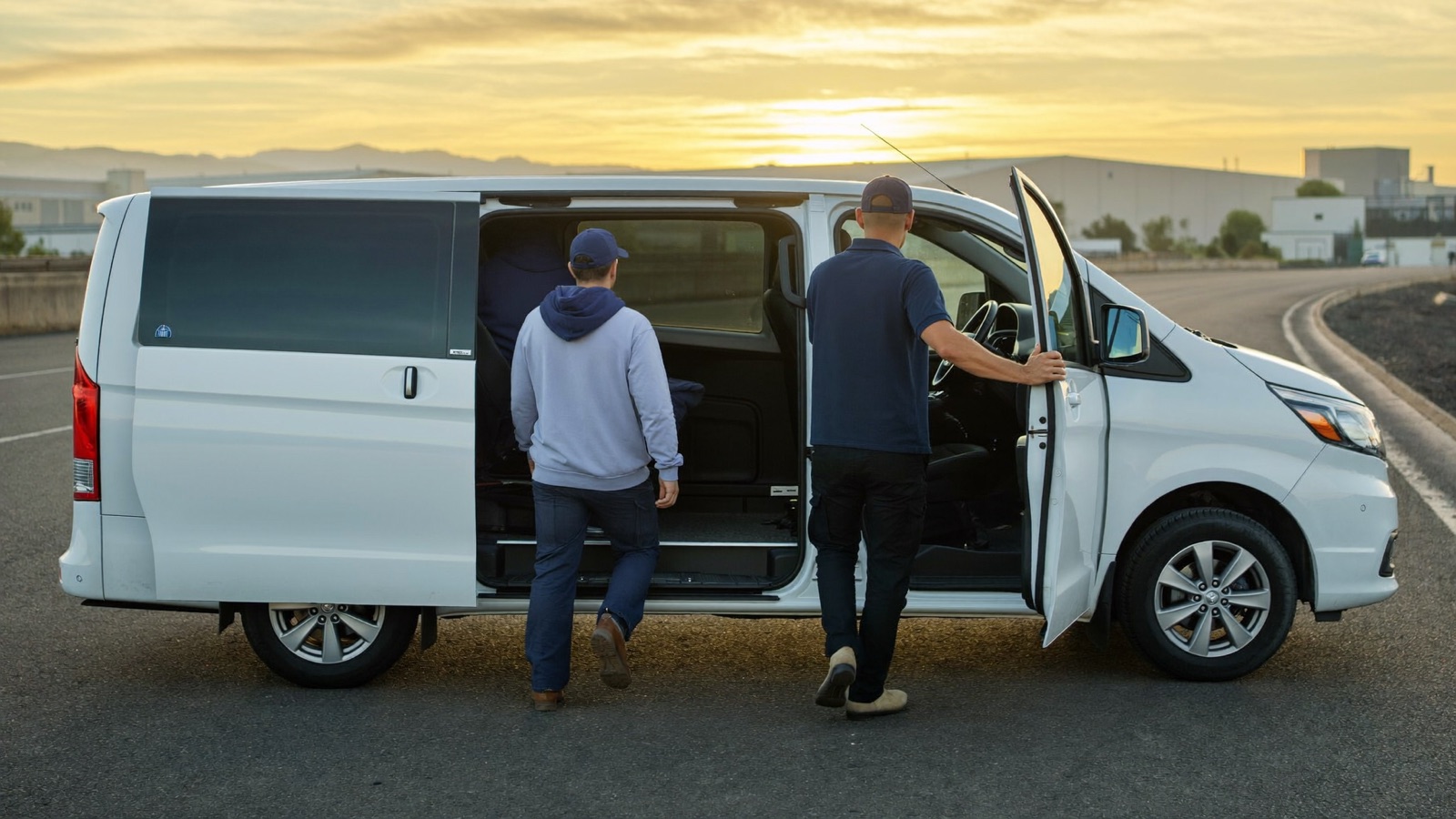 Boarding a van at dawn